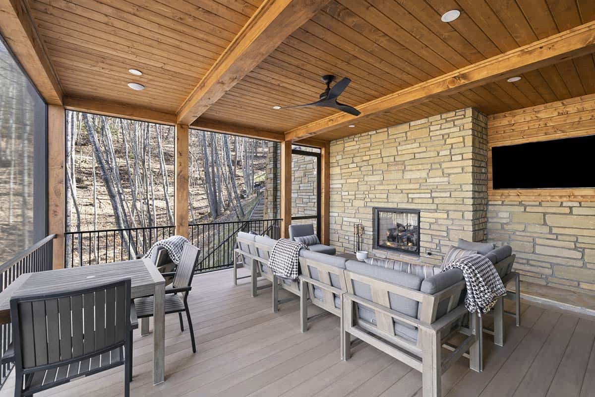 mountain cottage screened porch with a fireplace