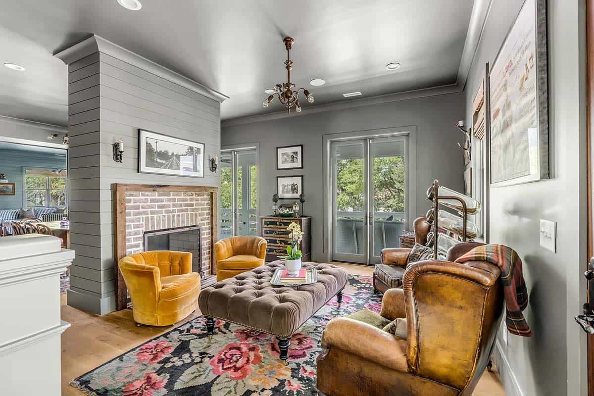 beach style living room with a fireplace