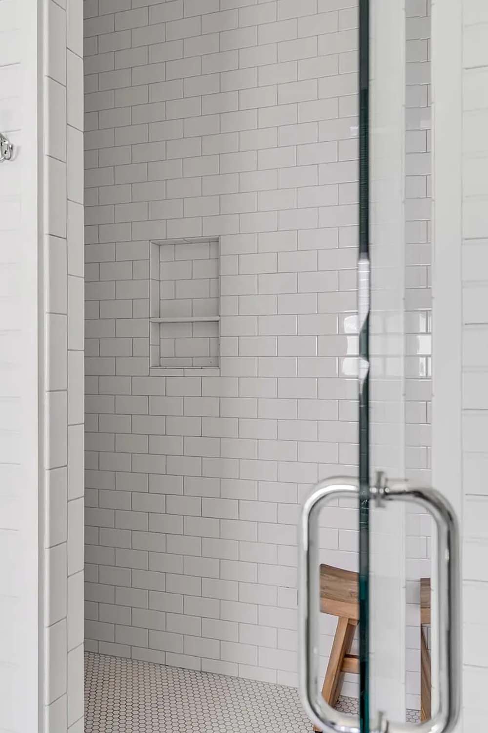 beach style bathroom with a shower