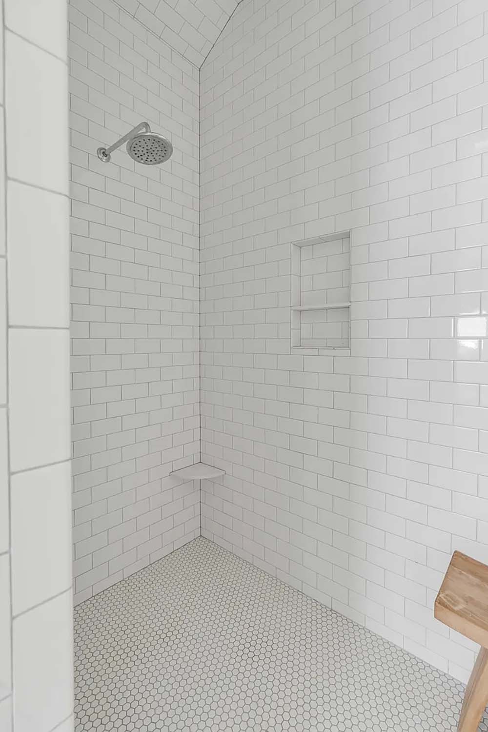 beach style bathroom with a shower