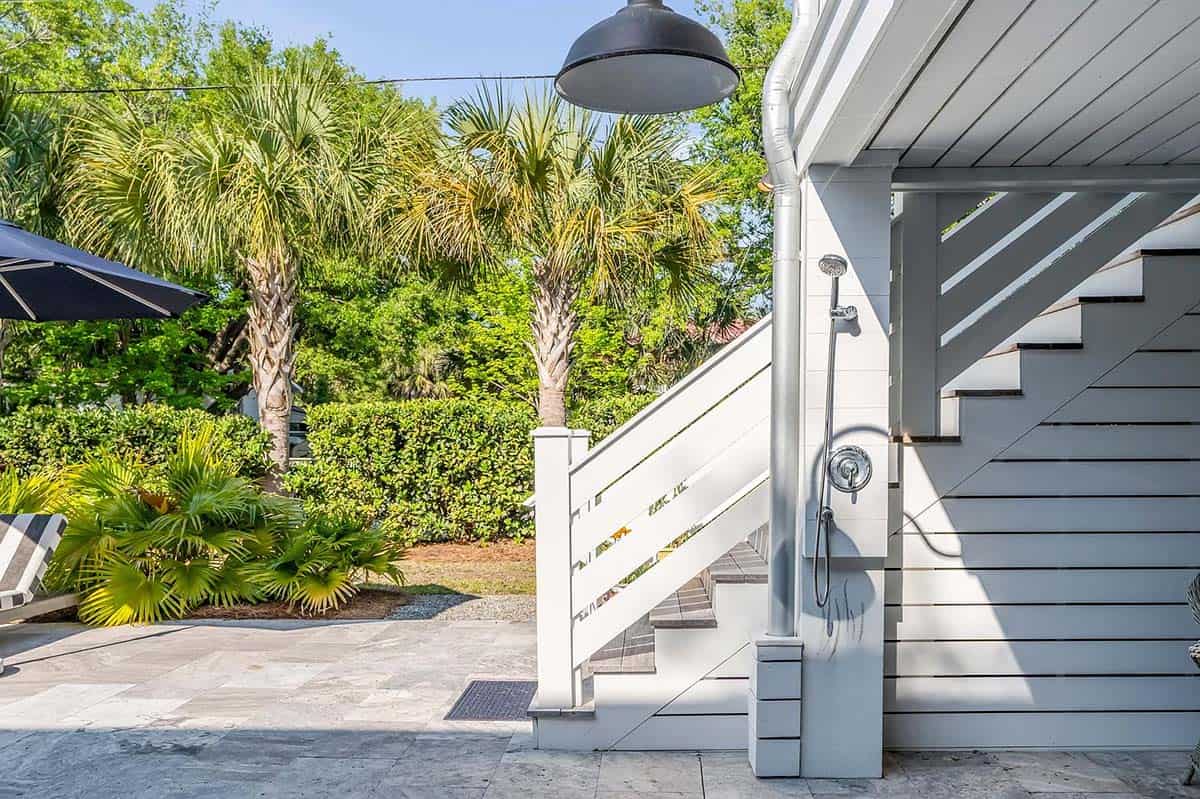 coastal style house exterior with an outdoor shower