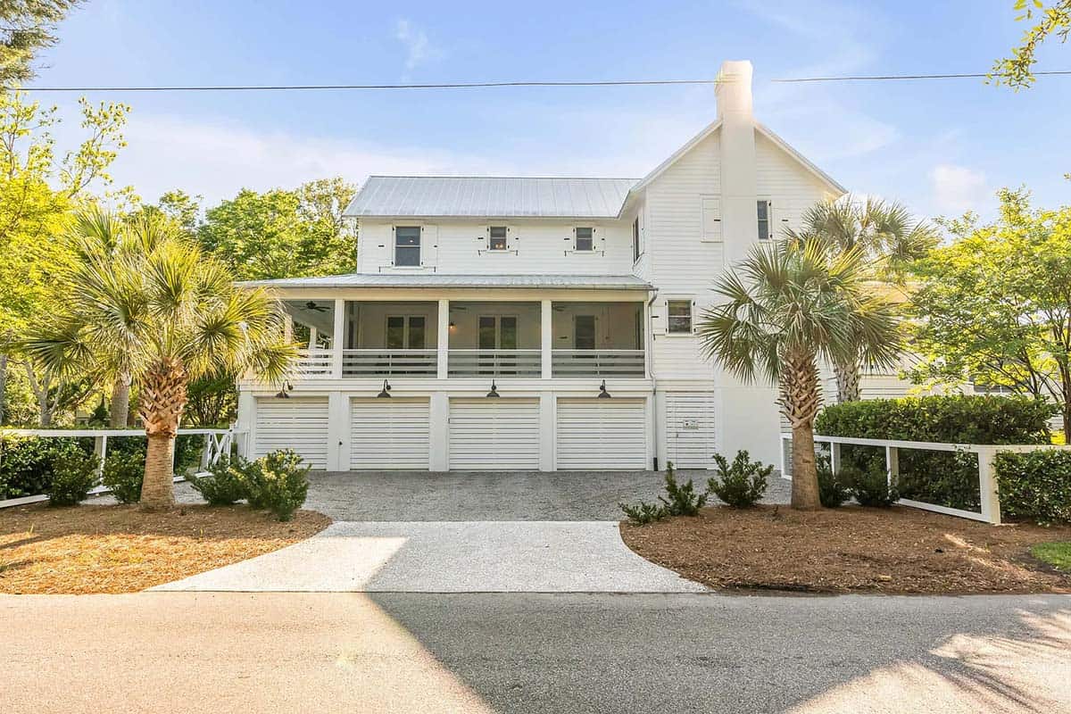 coastal style house exterior with a garage