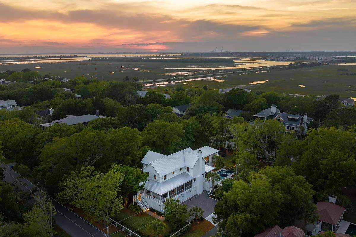 coastal style house exterior aerial view at dusk