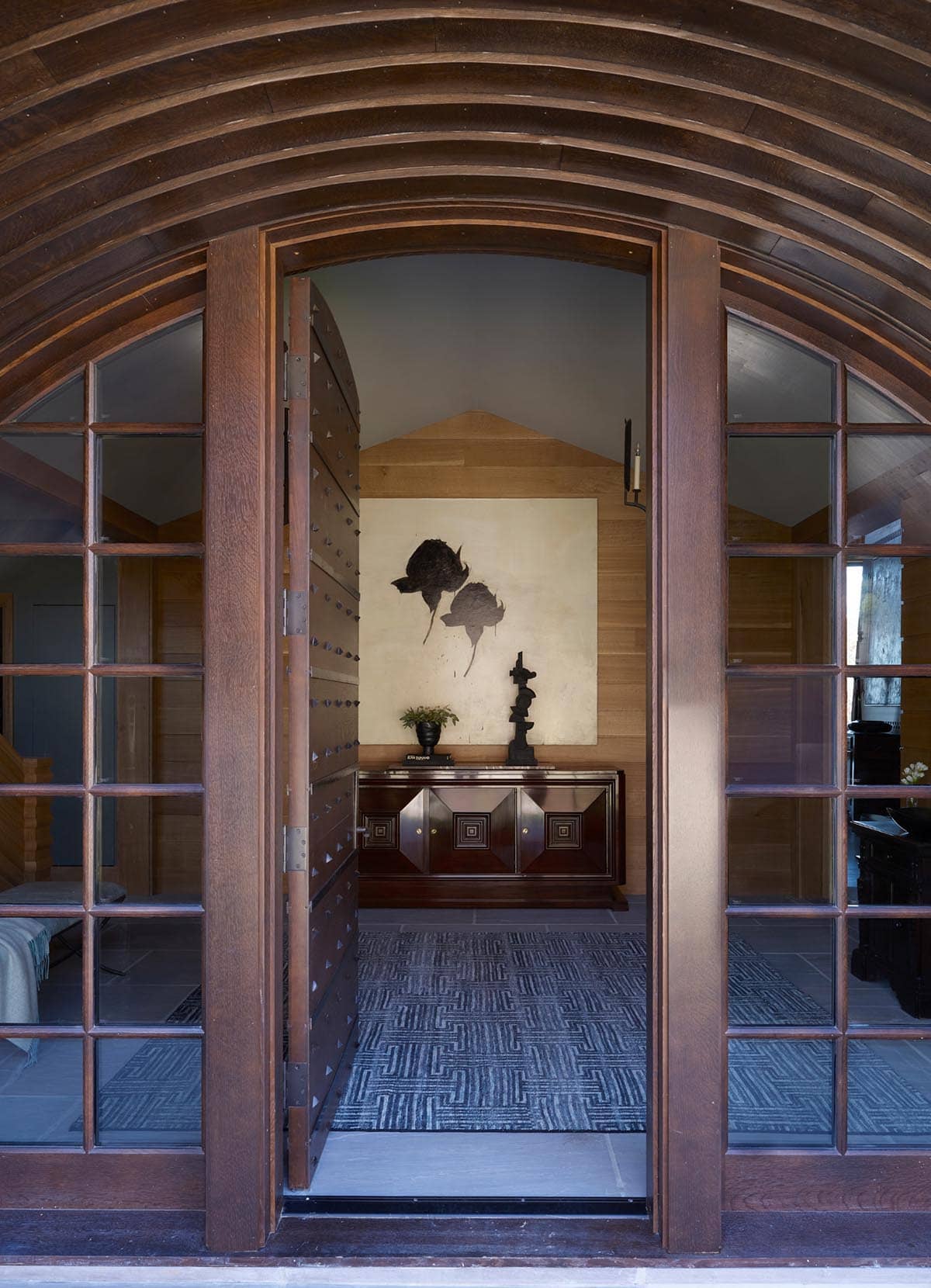 chalet-inspired lake house exterior entry