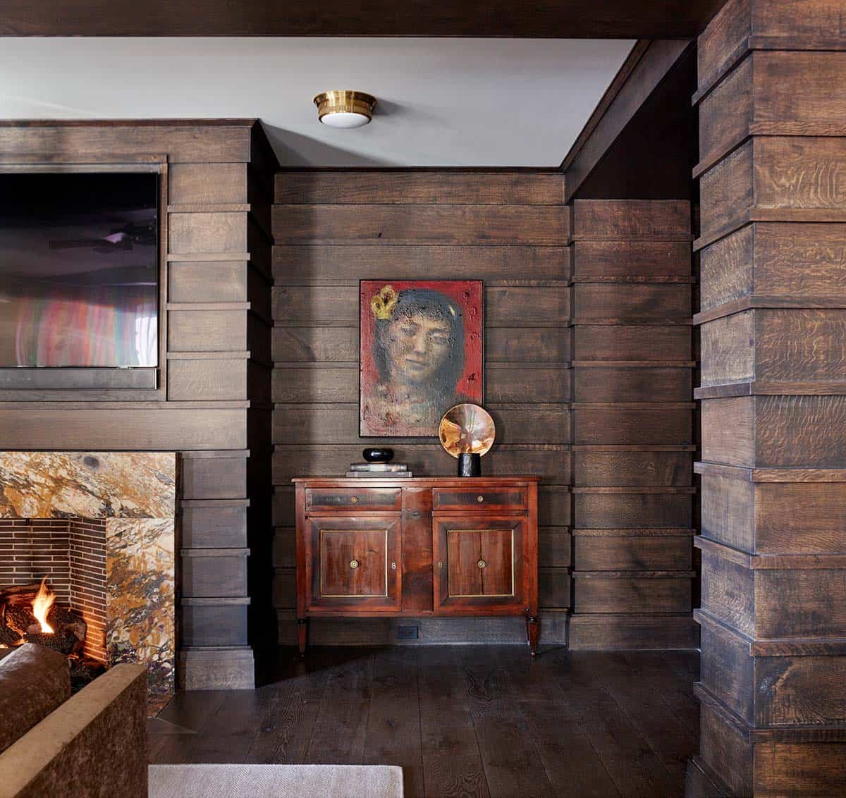 modern rustic family room with a fireplace