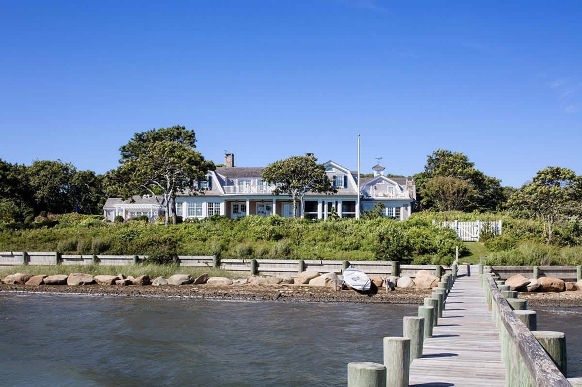 Beach Style Home Exterior with a dock