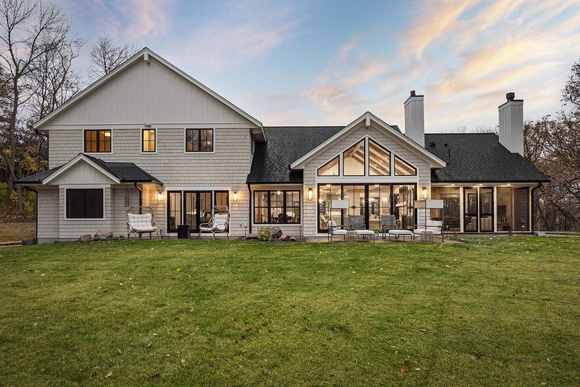 coastal style lake house exterior backyard landscaping