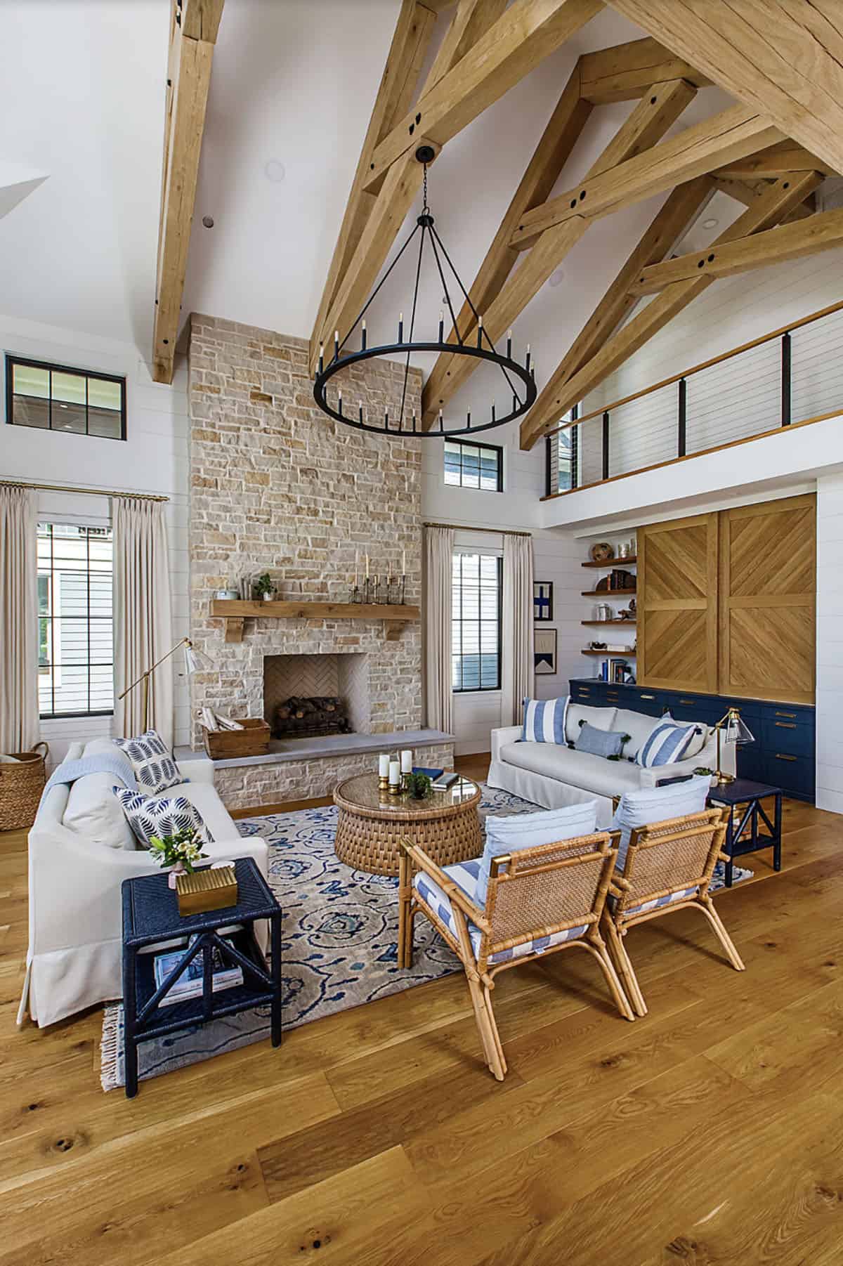 coastal style living room with a fireplace