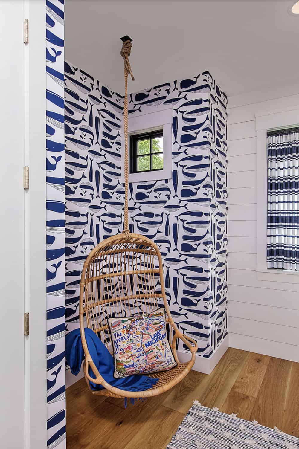 coastal style guest bedroom suite with a hanging chair