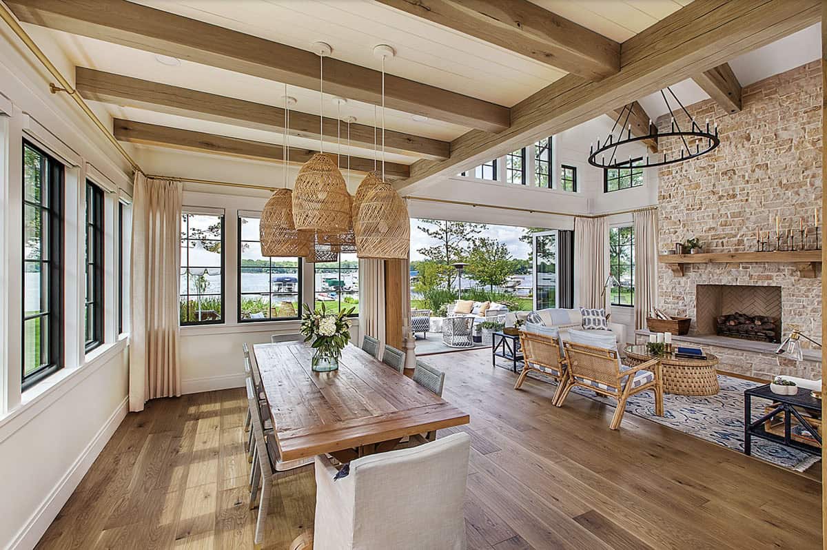 coastal style family room and dining room with exposed oak beams.