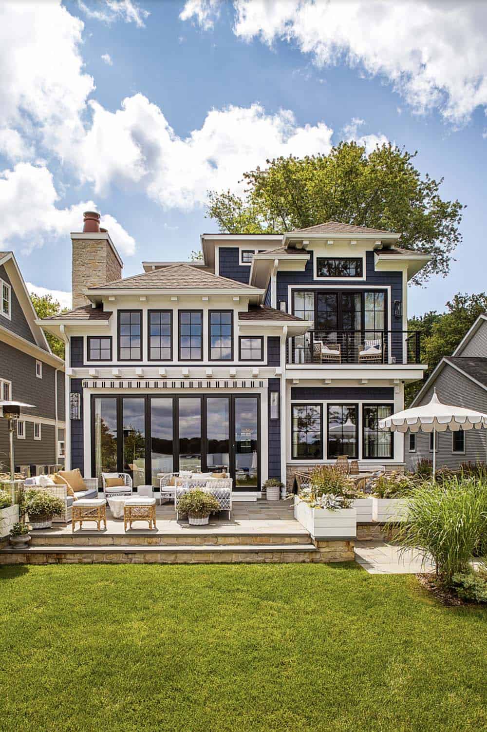 coastal style lake house backyard view