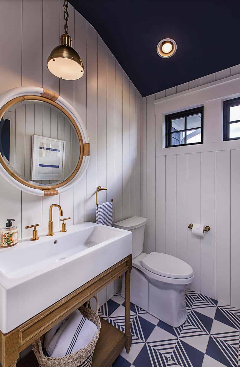 coastal style shiplap bathroom with freestanding vanity