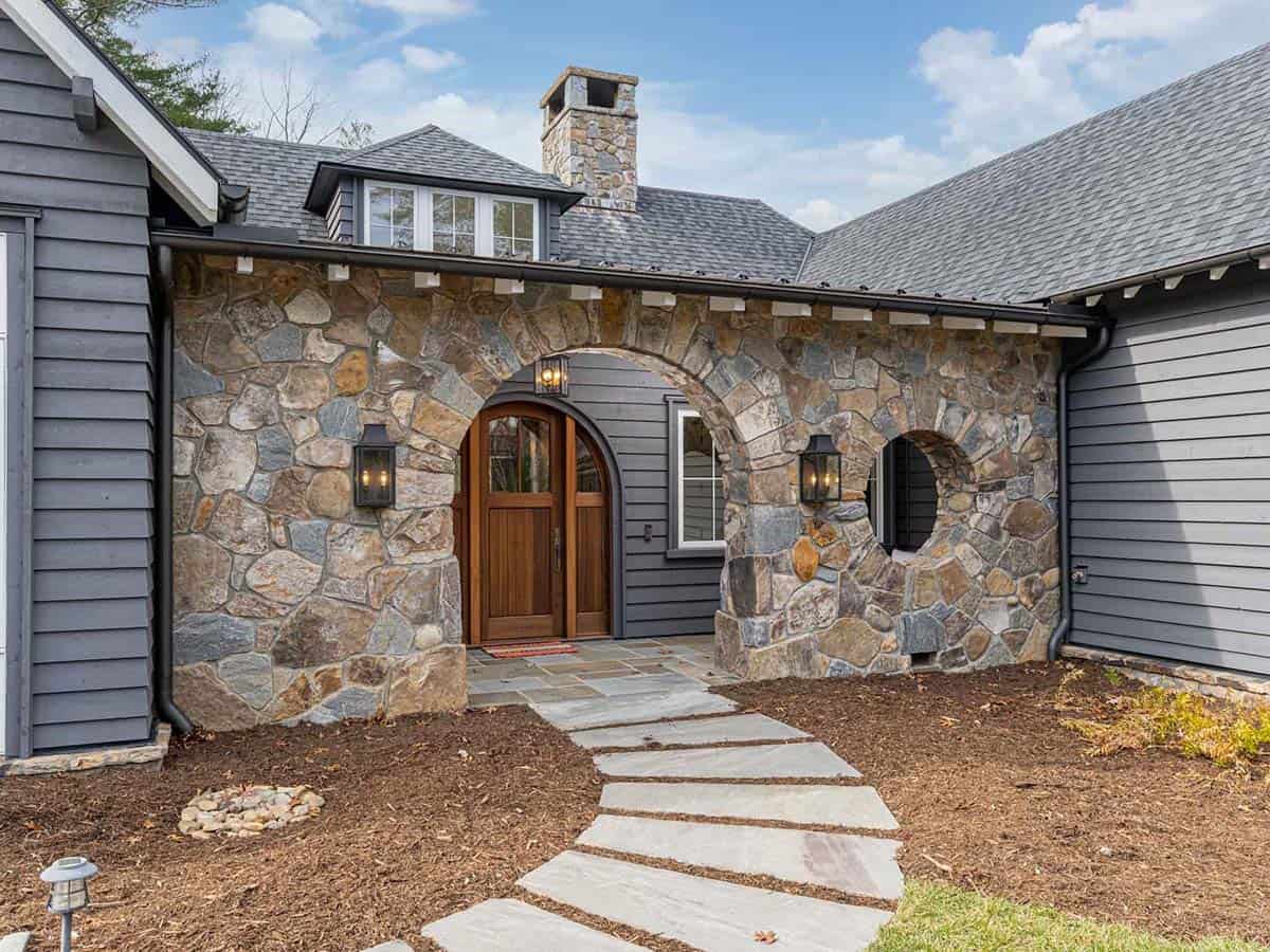 contemporary farmhouse home exterior entry with a pathway