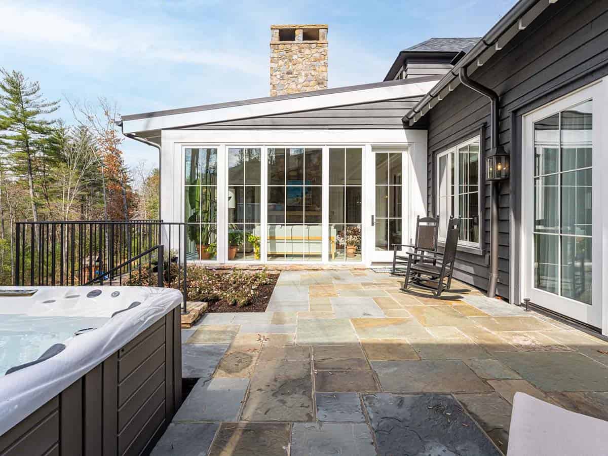contemporary farmhouse home exterior backyard with a patio
