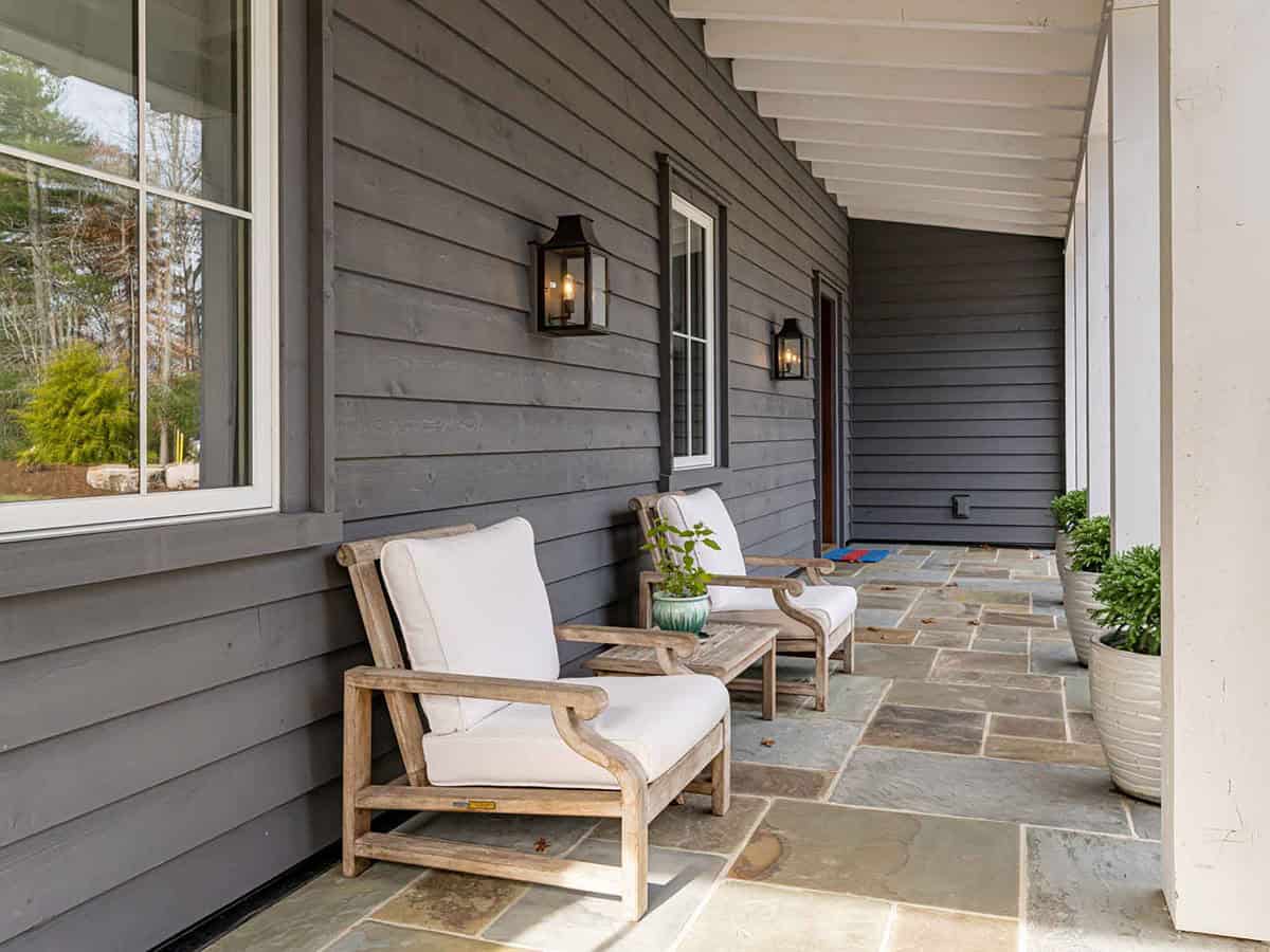 contemporary farmhouse home exterior with a covered porch