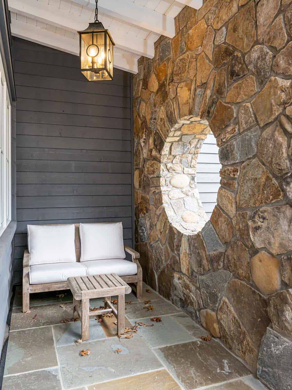 contemporary farmhouse home exterior with a covered porch
