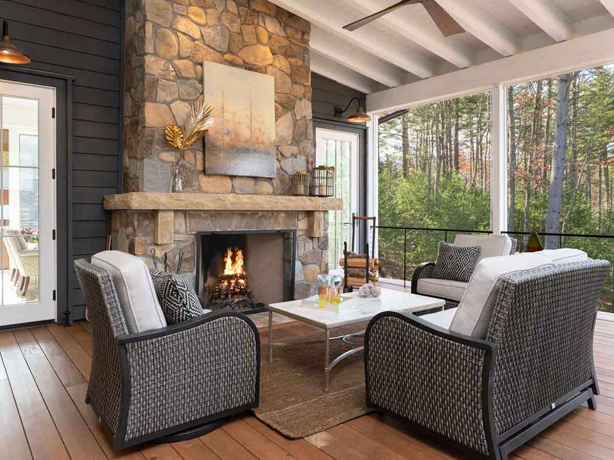contemporary farmhouse style sunroom with a fireplace