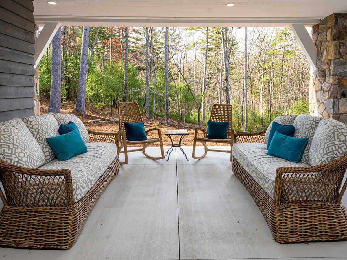 contemporary farmhouse style covered porch with outdoor furniture