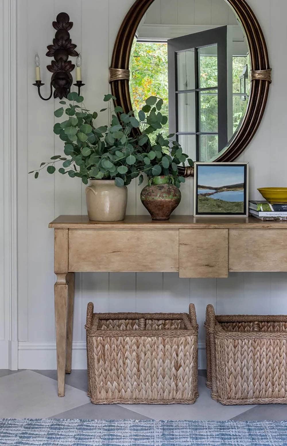 contemporary entry with a console table