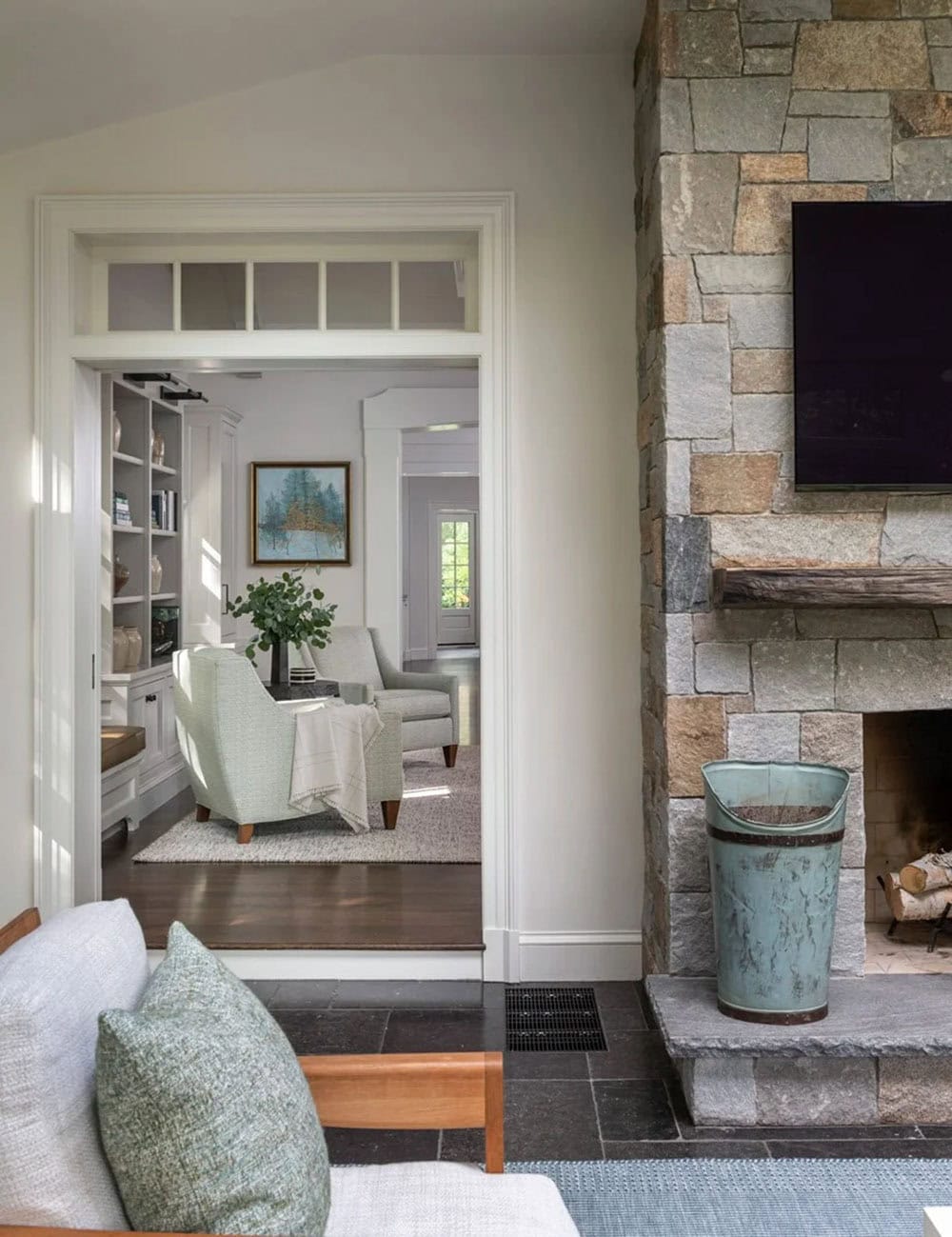 contemporary sunroom with a fireplace