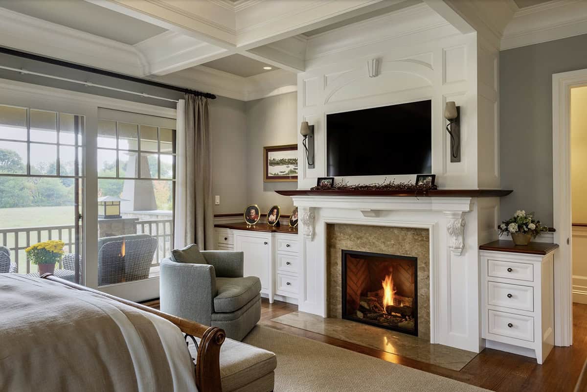 craftsman style bedroom with a fireplace