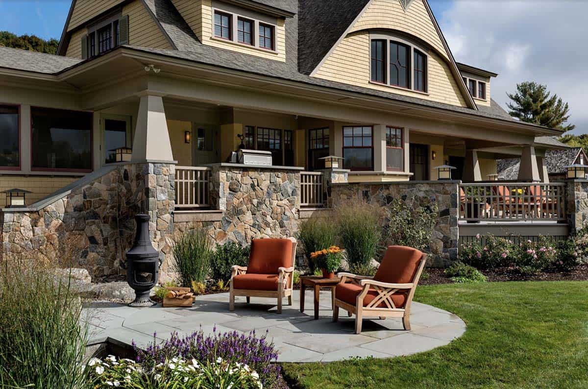 craftsman style house exterior with a patio and outdoor furniture