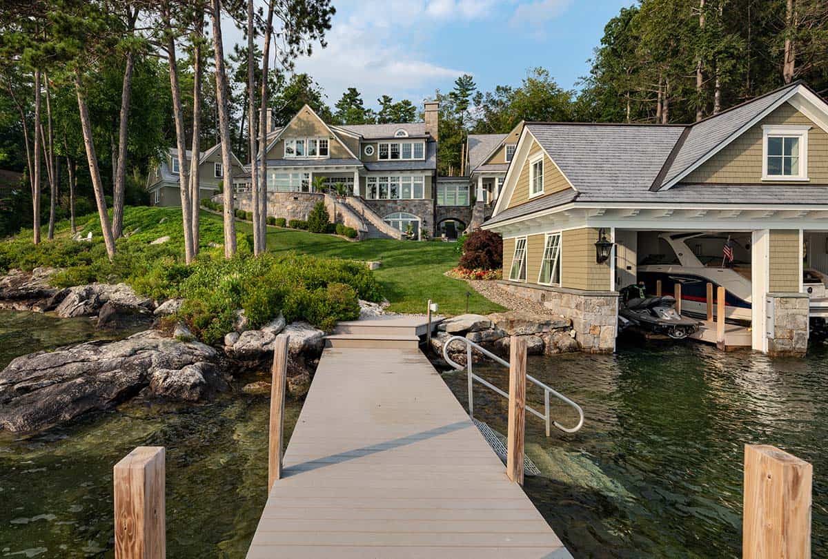 lake house exterior with a boat house and dock