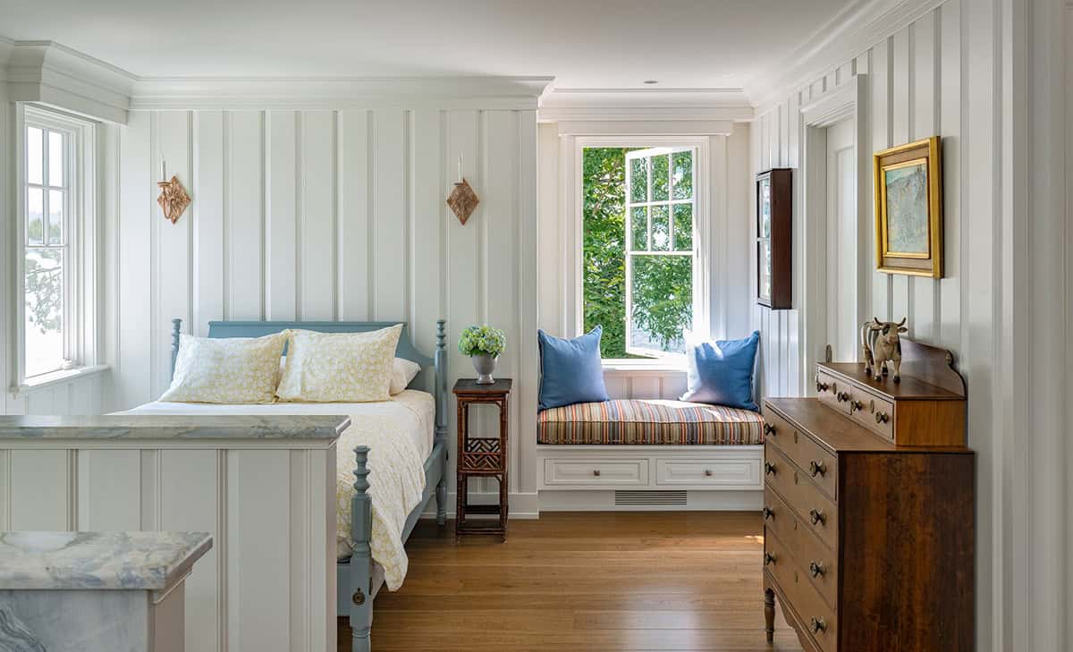 contemporary bedroom with a built-in window seat
