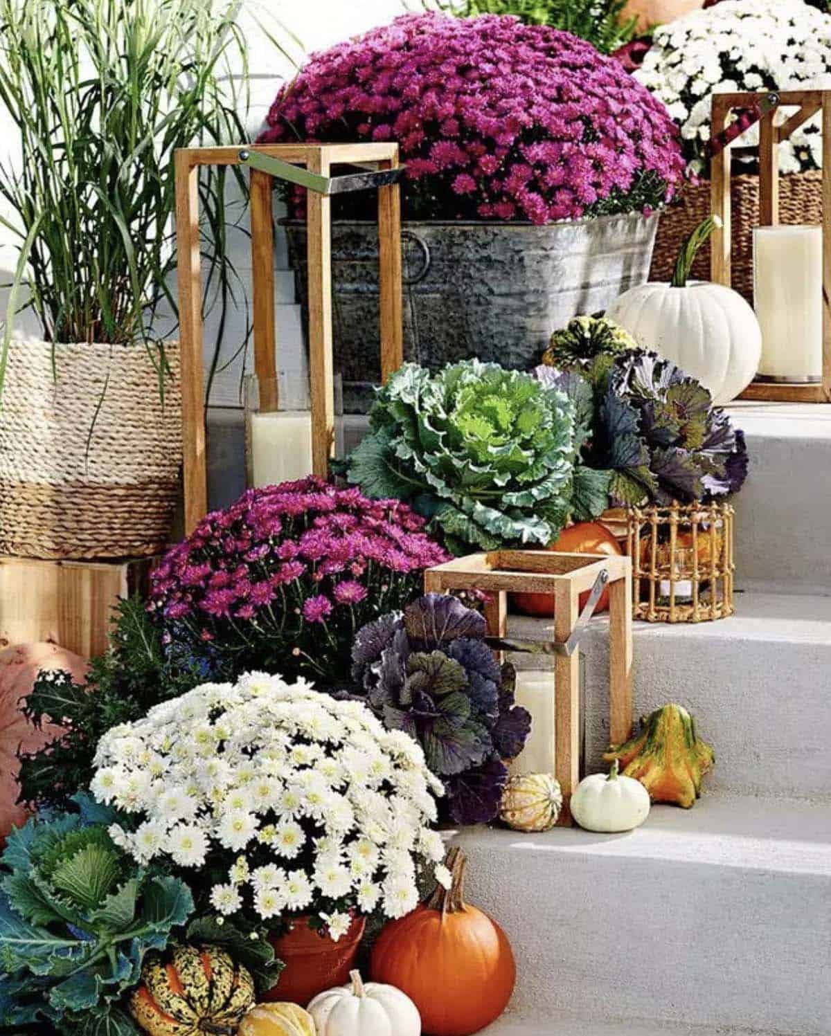 fall front porch steps with  pumpkins, gourds, and mums