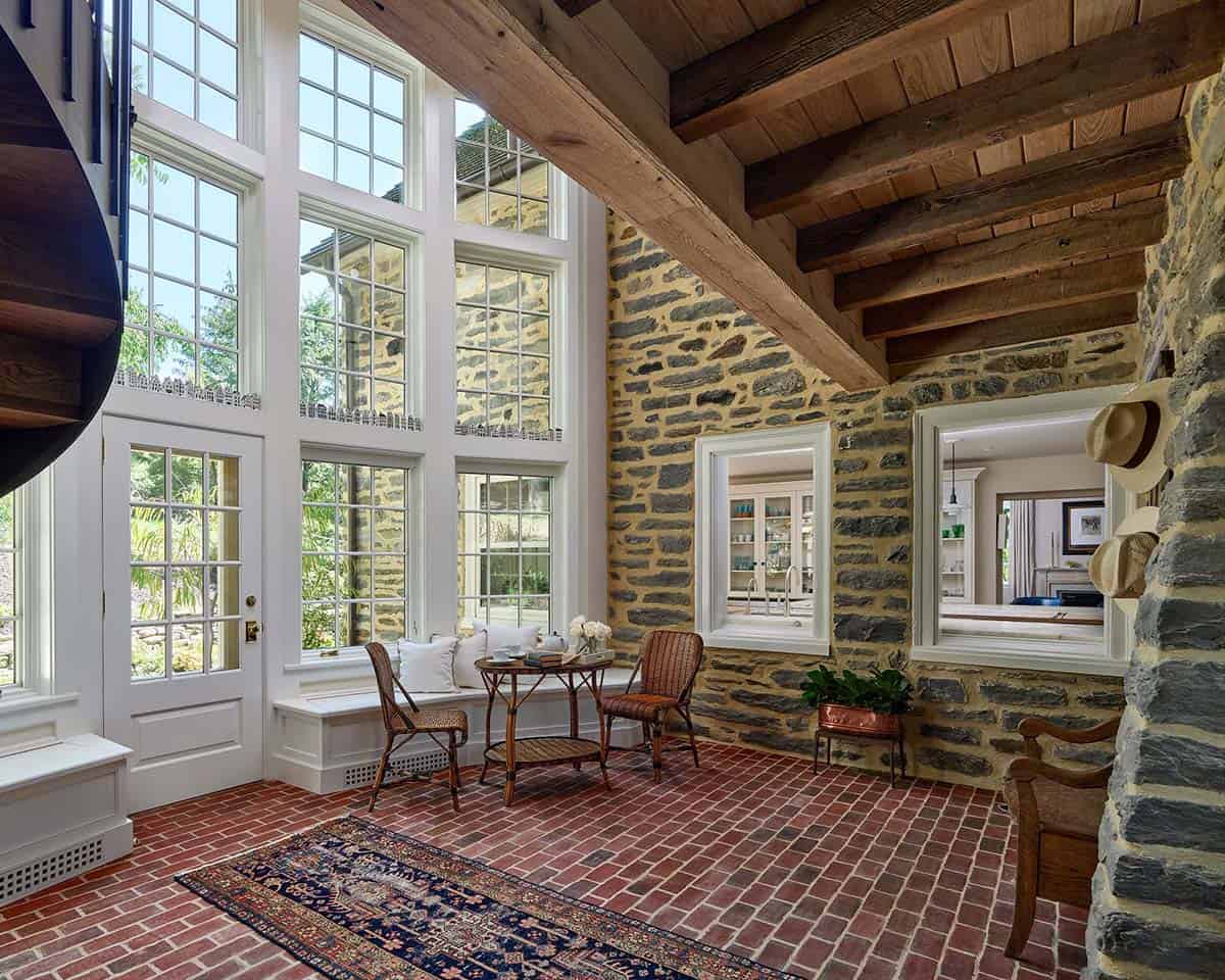 stone cottage with a glassy atrium