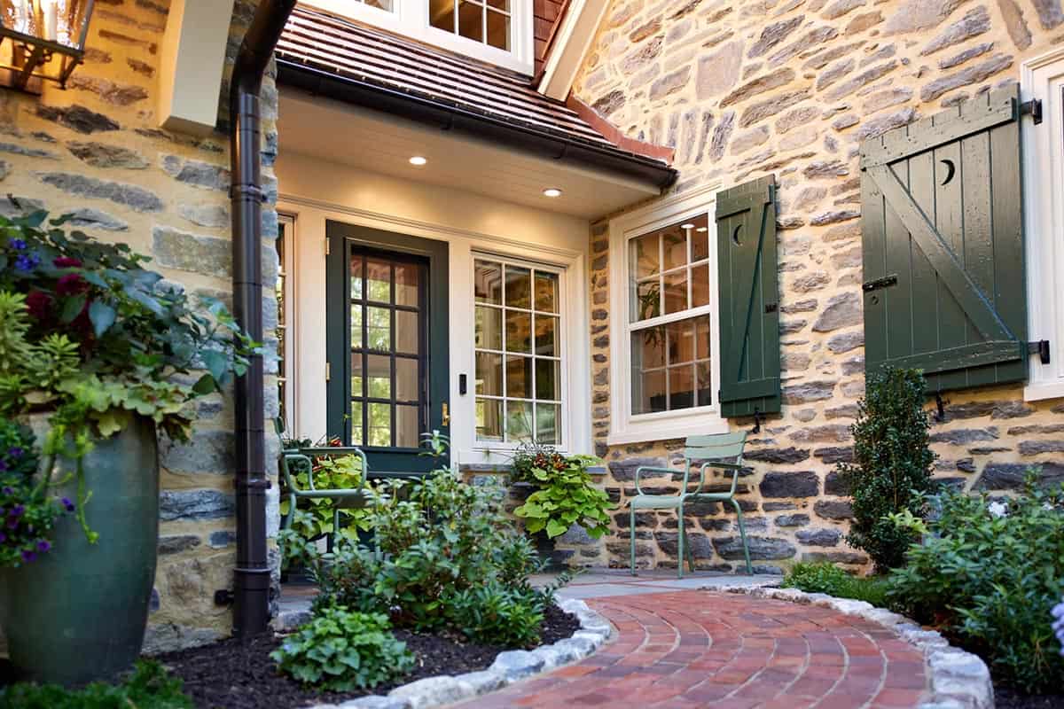 stone house exterior with a walkway