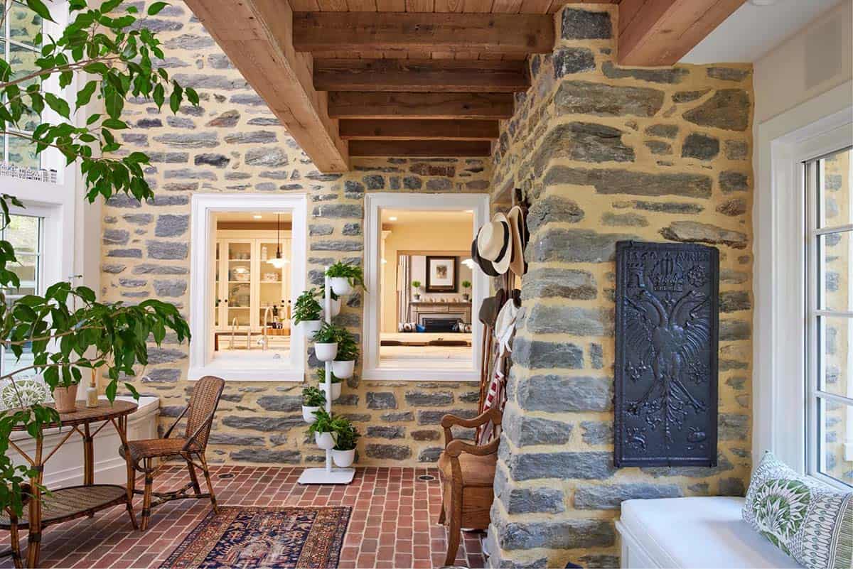 stone cottage with a glassy atrium