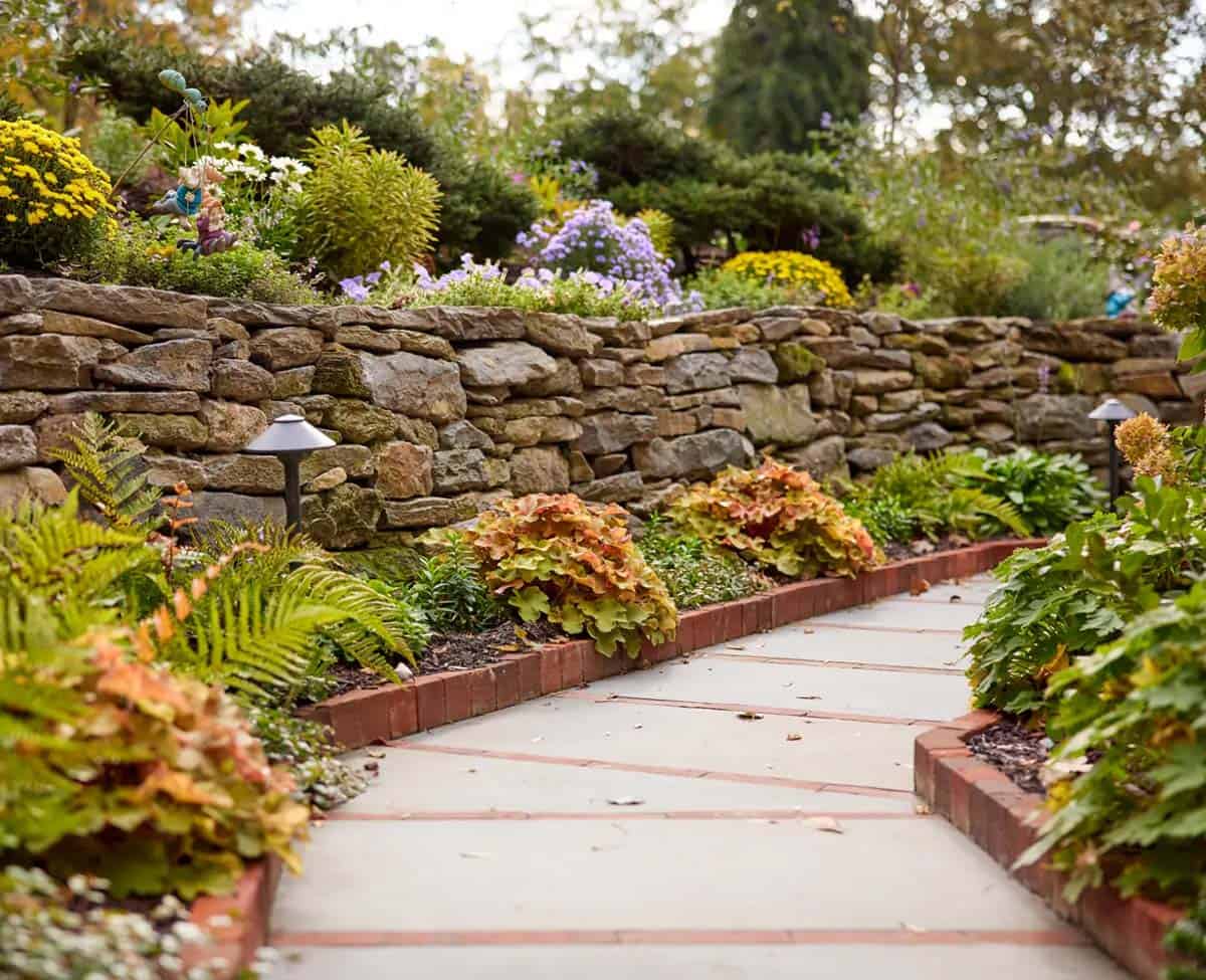 stone house exterior pathway and landscaping