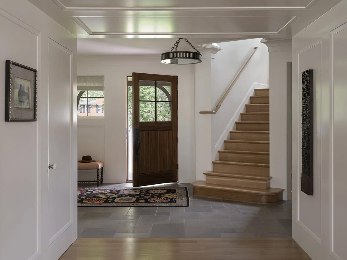 tudor house entry with a staircase