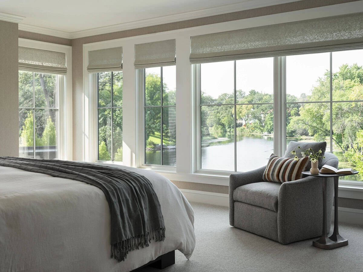 contemporary bedroom with a large window