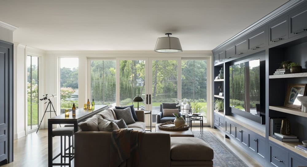 contemporary family room with large windows