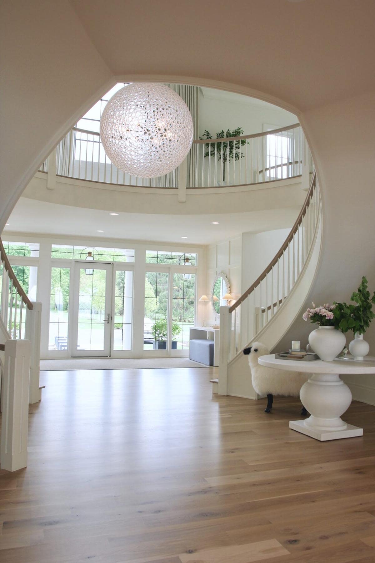 contemporary entry with a grand staircase