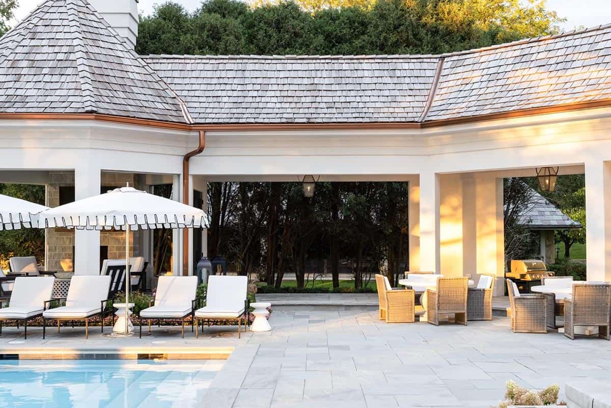 lake house exterior with a pool