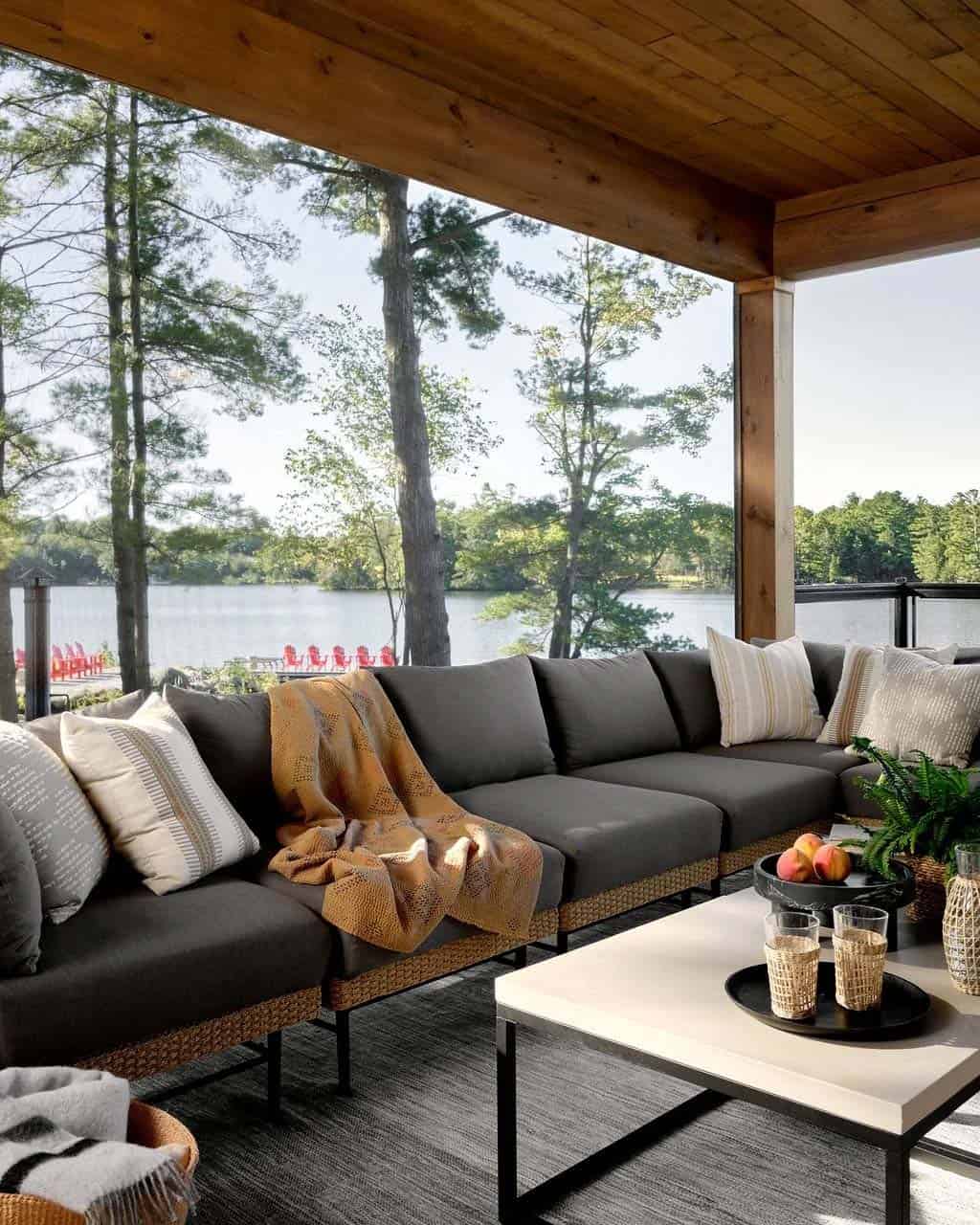 transitional style lake house balcony with outdoor furniture