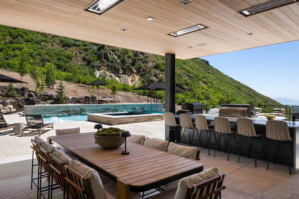 luxury modern home exterior with a covered patio