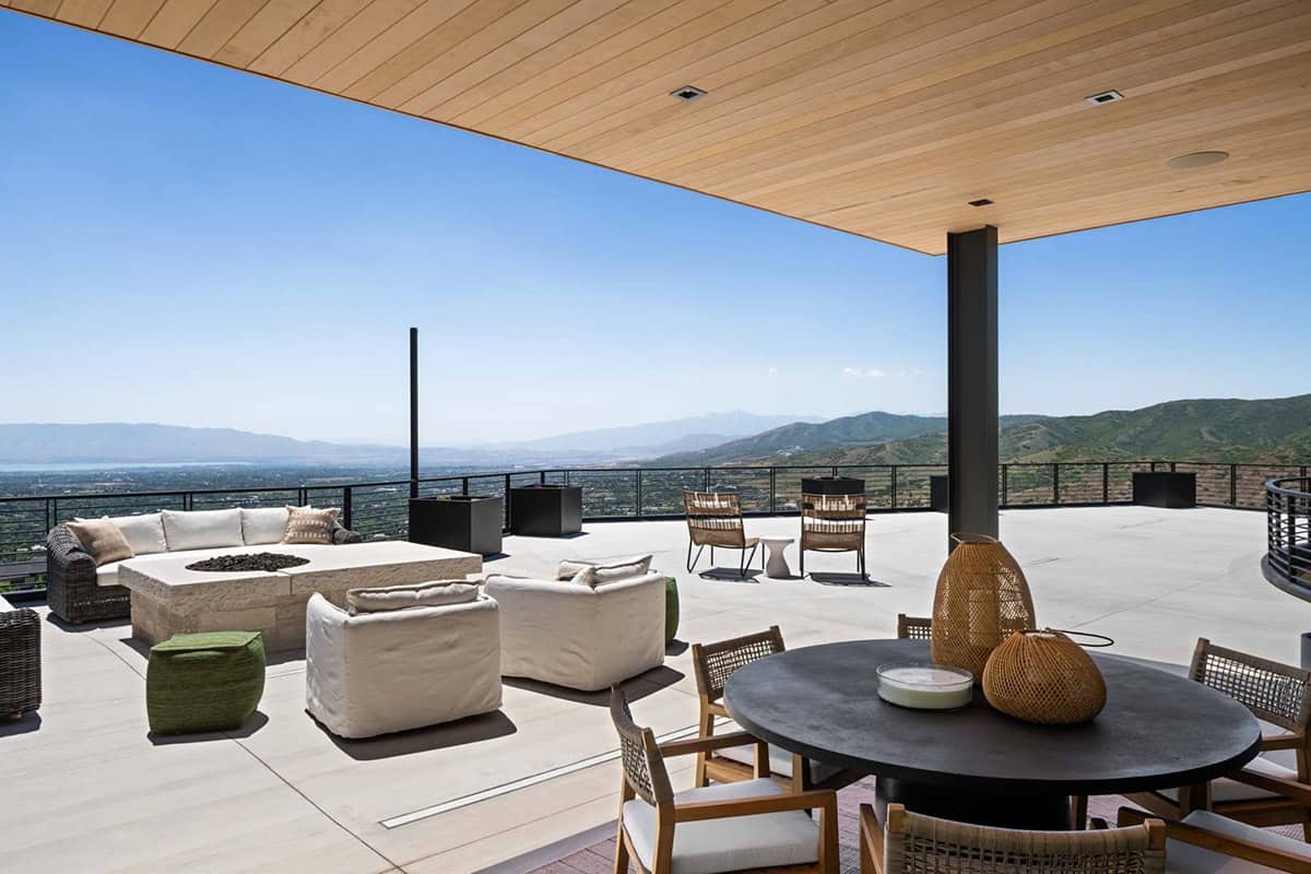 luxury modern home exterior with a covered patio