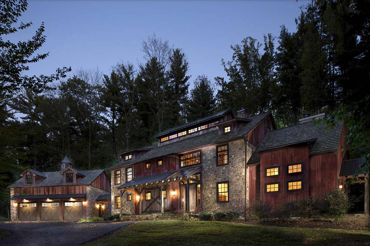 barn house exterior in the woods at dusk