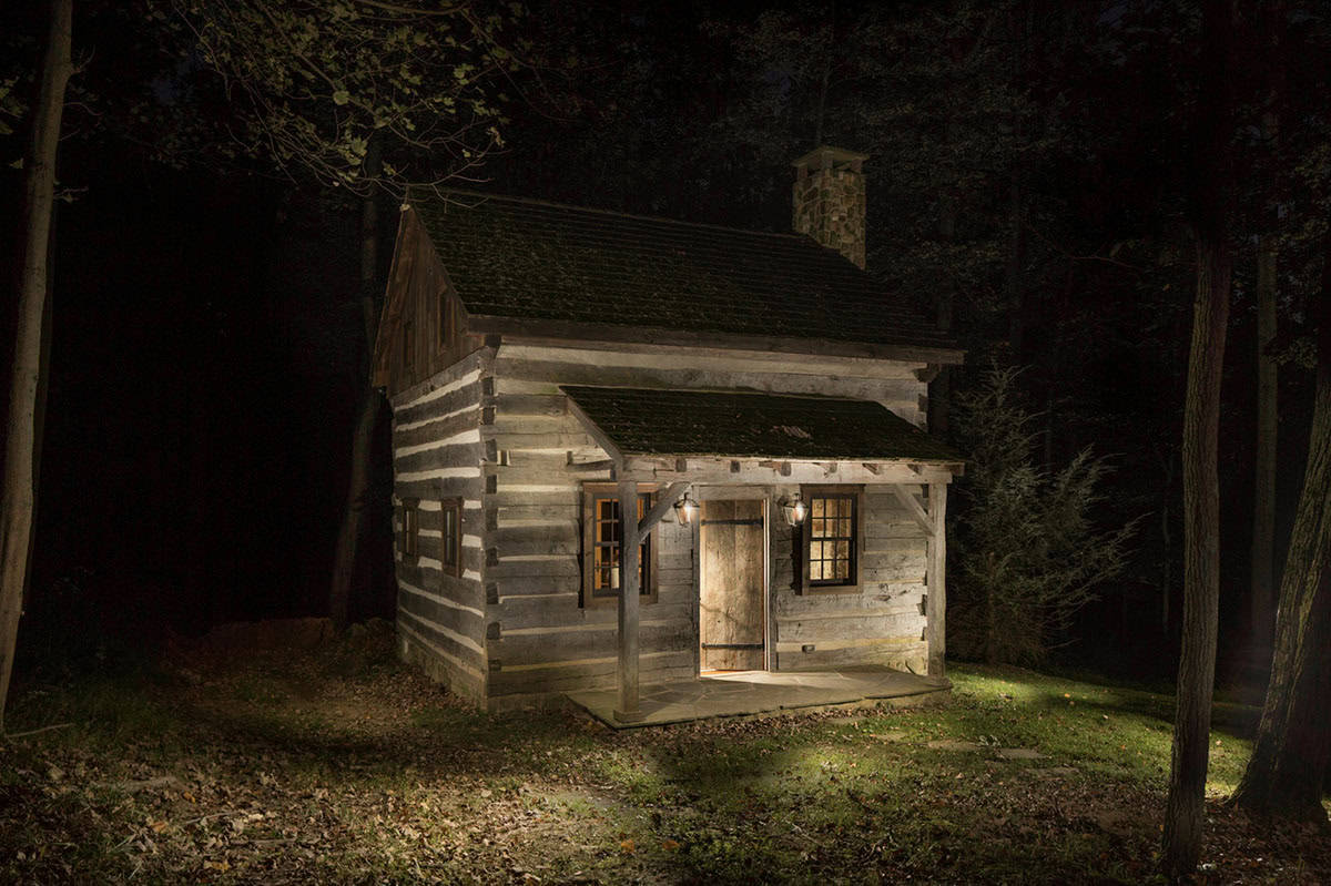 barn style guest house exterior at dusk