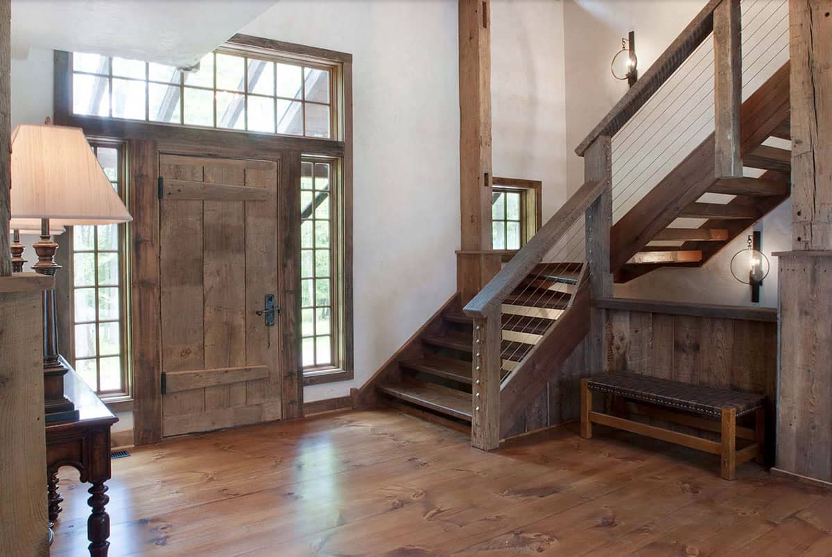 barn house entry with a staircase