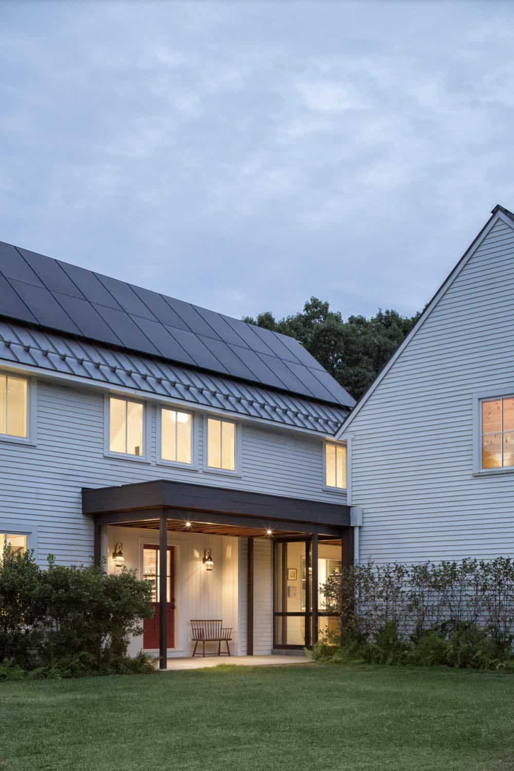 modern farmhouse exterior at dusk
