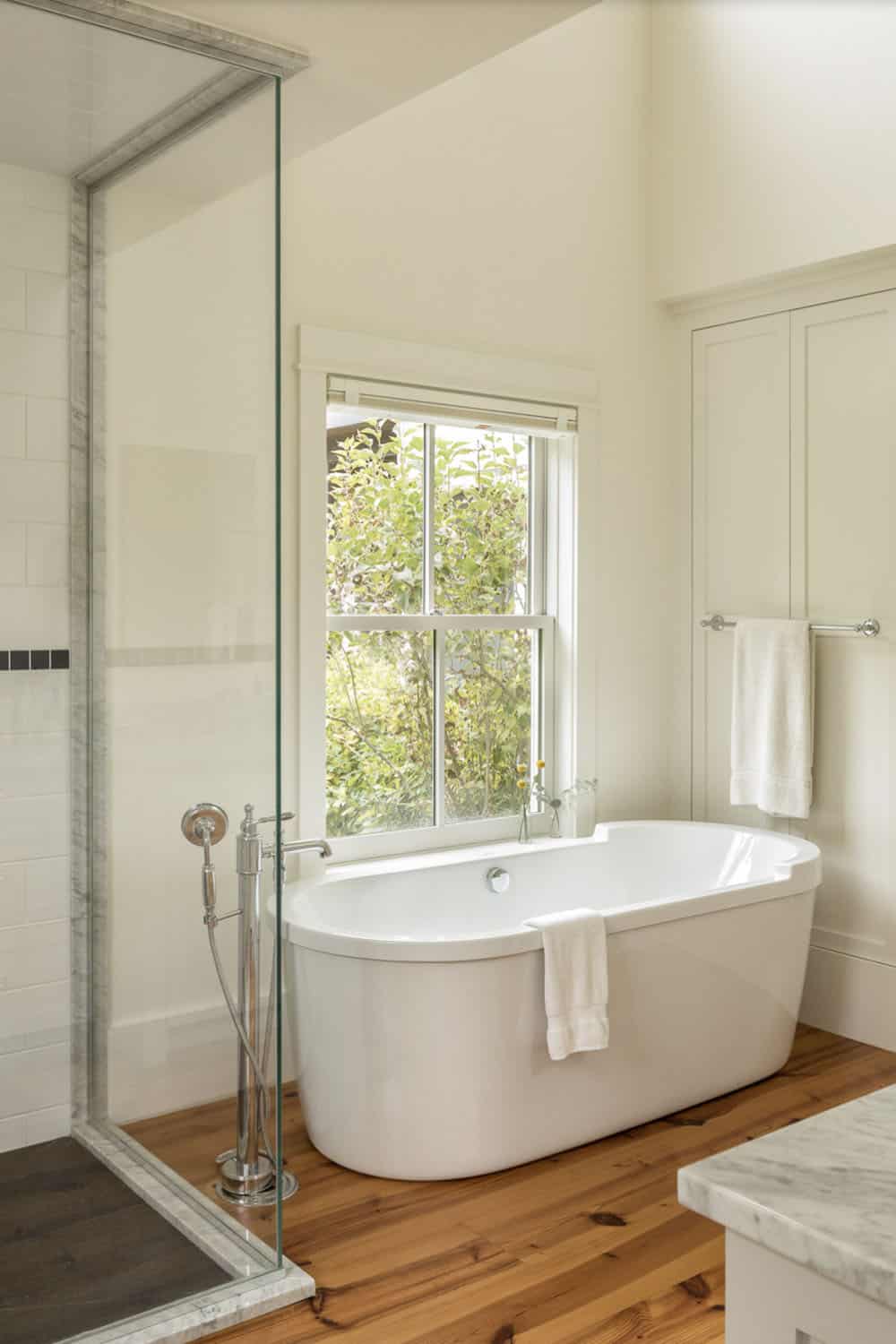 modern farmhouse bathroom with a freestanding tub