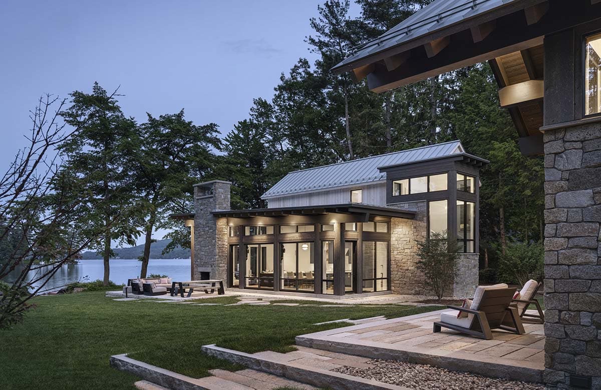 modern lake house exterior at dusk