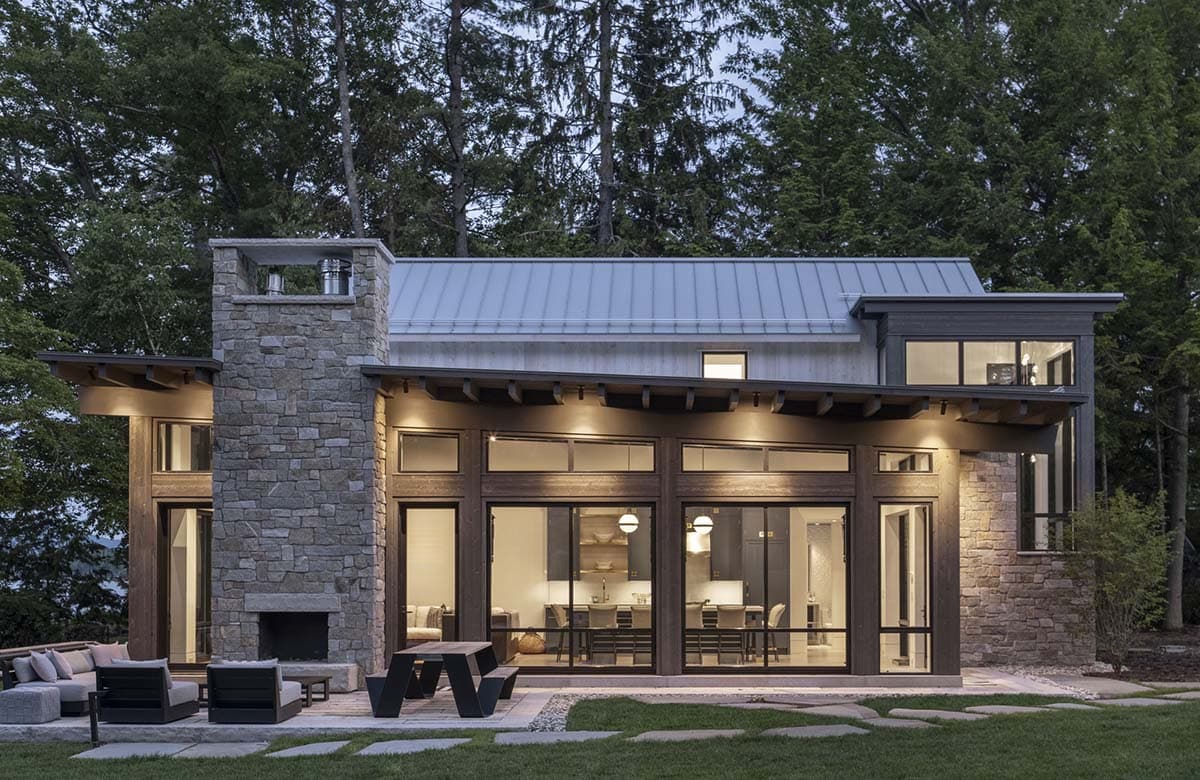 modern lake house exterior at dusk