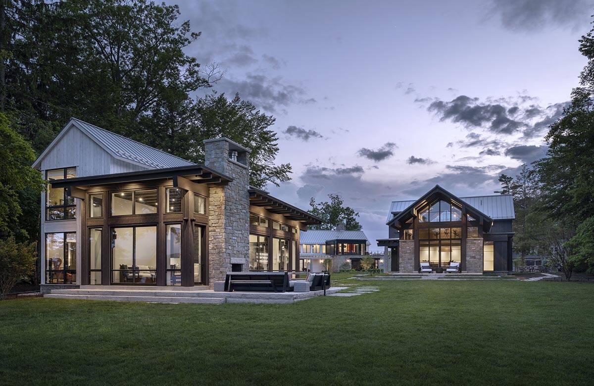modern lake house exterior at dusk