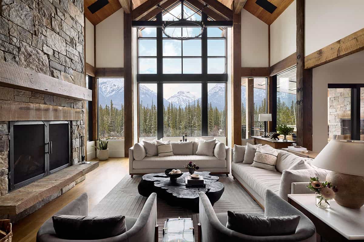 modern mountain style living room with large windows